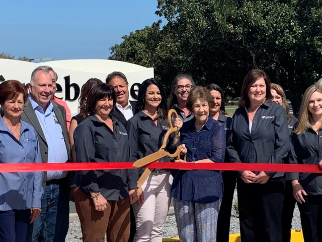 Ribbon cutting at 210 Mystic Blvd, September 2019